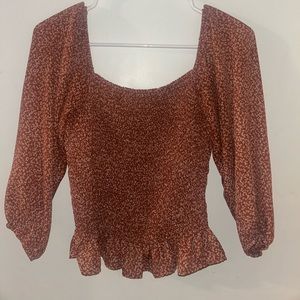 cute maroon top with white flower detailing !